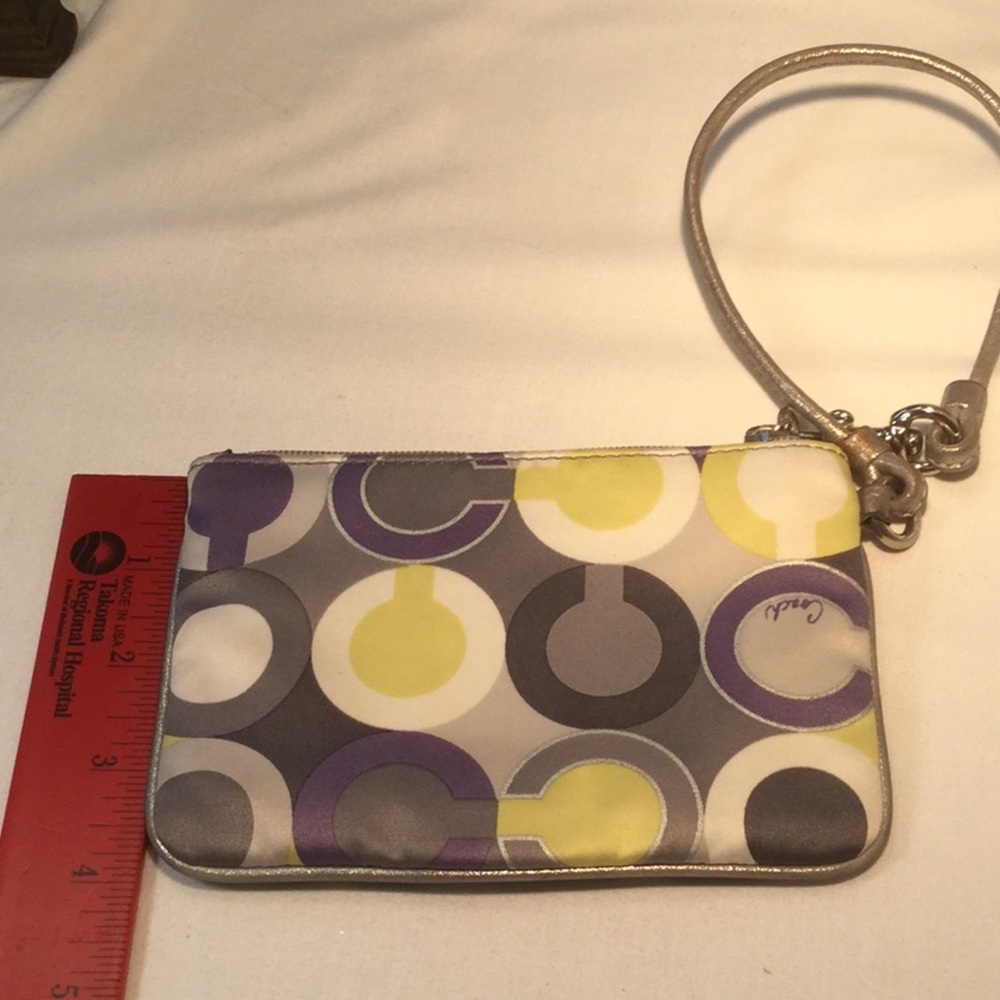 Scarf print Coach wristlet in very nice co…